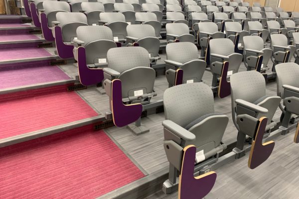 Auditorium seating with online tablet arm